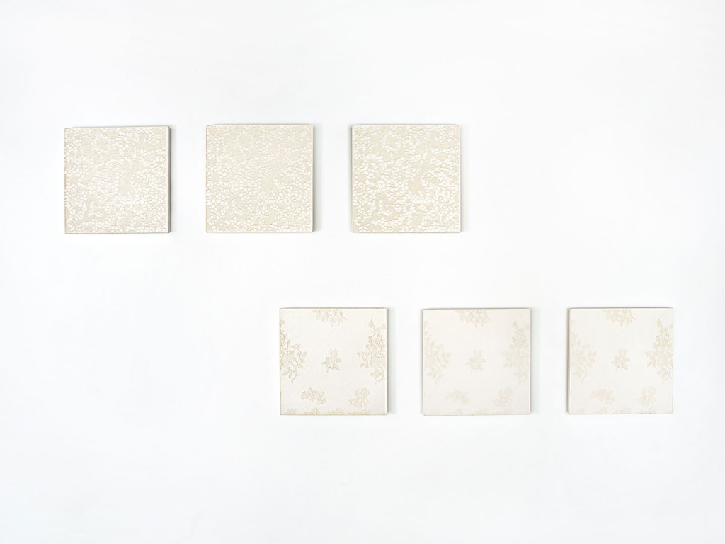 6 concrete tiles with delicate reliefs of lace and florals creates 2 series with 3 tiles each of modern wall art.