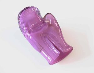 Bubblegum pink glass blown boxing glove as feminist art