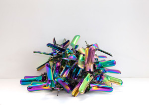 Rainbow speculum sculptures as feminist art by Zoe Buckman