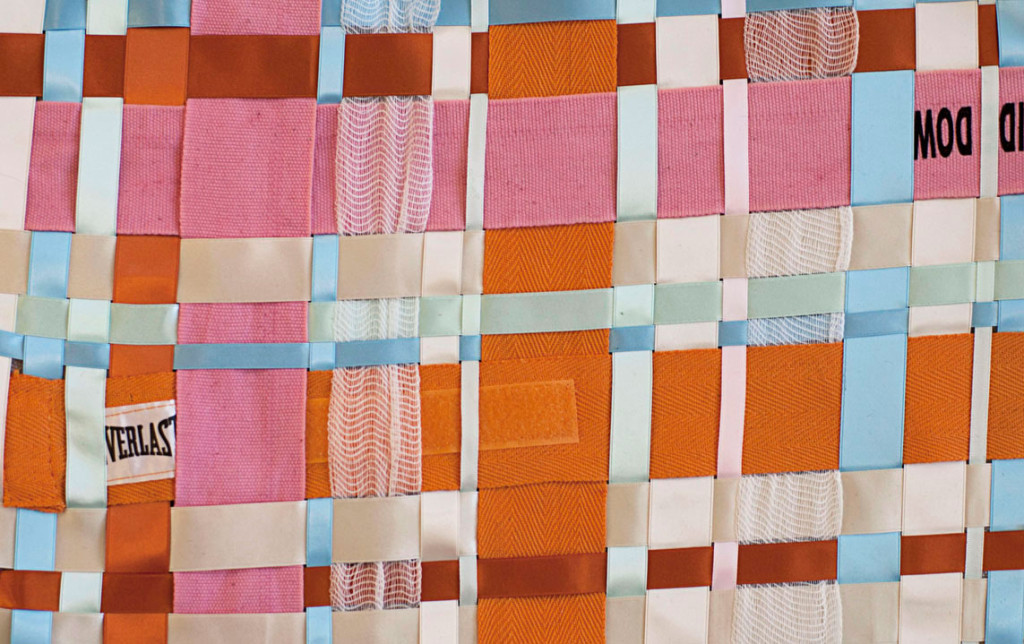 Woven fabric with gauze and boxing wraps as fabric feminist art by Zoe Buckman