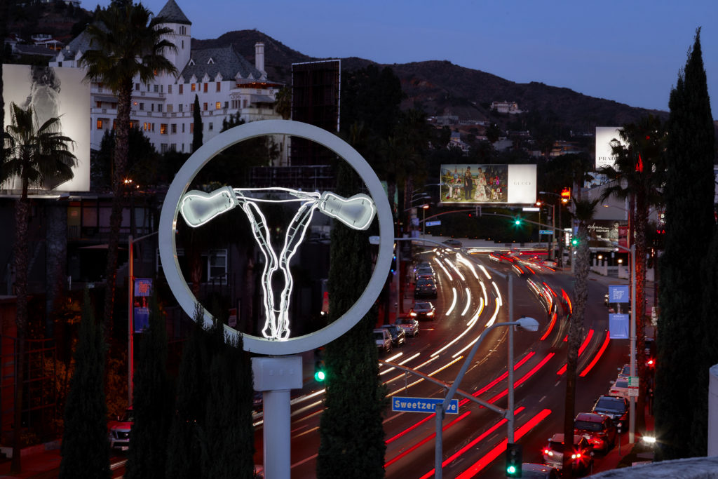 Champ Overlooking Sunset Strip Boulevard Traffic